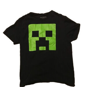 𝅺minecraft T-shirt.  Men’s size small, but seems more like a woman’s small.